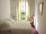 The comfortable bedroom at Moulin Rouge.