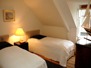 Upstairs bedroom with two twin size beds